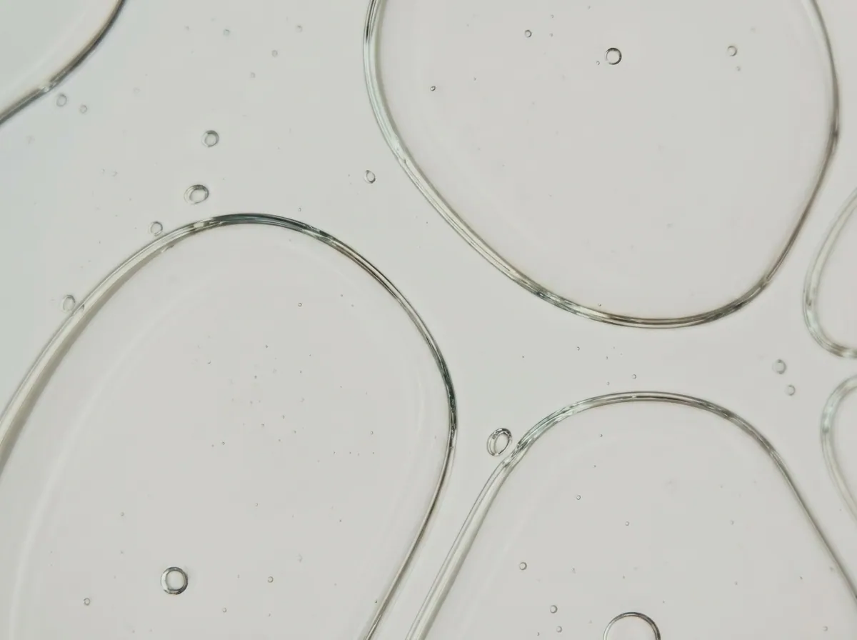 Macro of clear gel droplets, like a lab sample